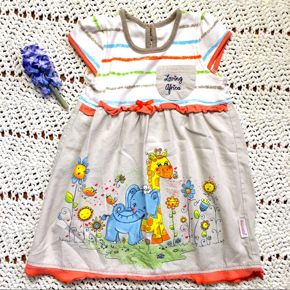 Cute summer dress. Neutral tones.Safari animals.